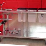 kettle corn sifting machines, kettle corn cooling tables, kettle corn kernel collector, kettle corn kitchen, kettle corn popping machines, kettle corn machines online, kettle corn machines in the USA, american made kettle corn machines, portable kettle corn machines, custom cannopy tents, custom caravan tents, portable hand washing sink and storage rack